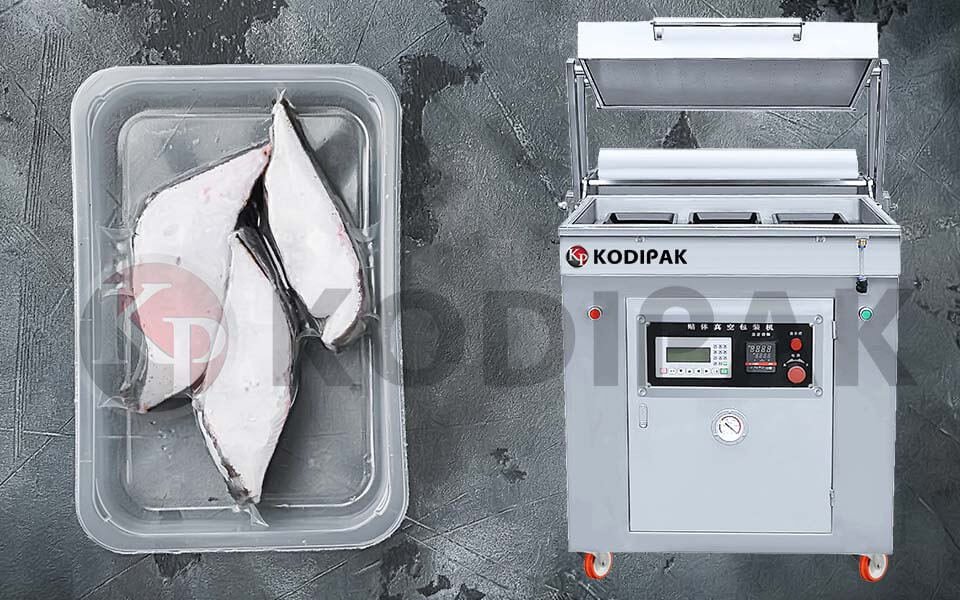 Manual cutting vacuum skin pack machine for fish - Kodipak